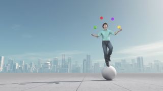 Man juggling on ball