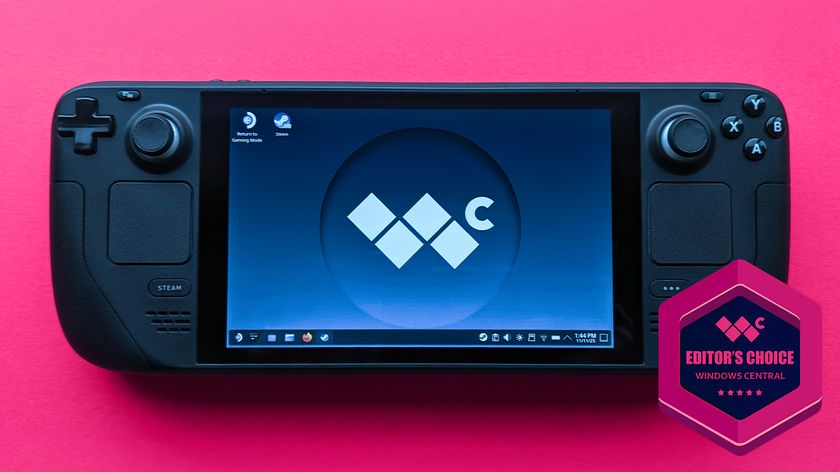 Valve Steam Deck (LCD) handheld gaming PC on a pink card background