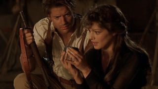 Rachel Weisz as Evie and Brendan Fraser as Rick in The Mummy (1999). 
