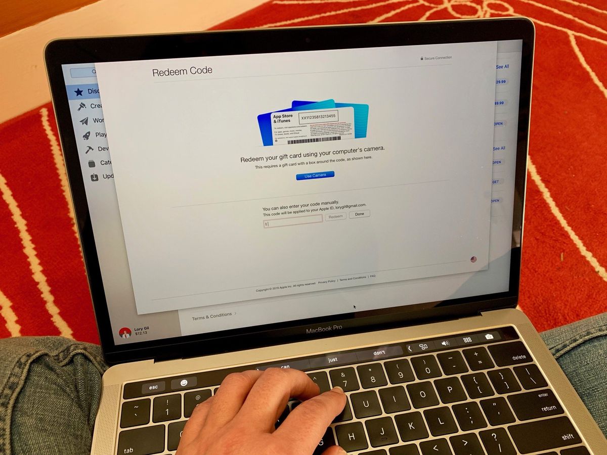 Como resgatar o código promocional na loja Mac App Store?