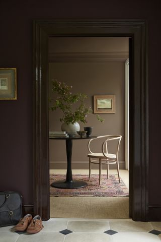 Two-toned brown living room and hallway