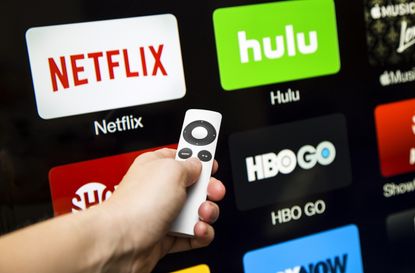 Canton, GA, USA - October 4, 2015 Netflix, hulu, and hbo subscription streaming video service accessed through a Apple tv and displayed on a hd tv.These application are paid services popular 