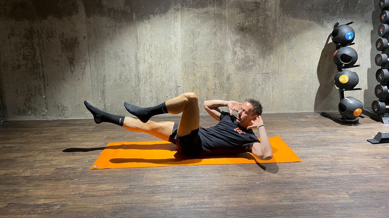 Matt Kendrick demonstrates how to do Pilates criss cross move