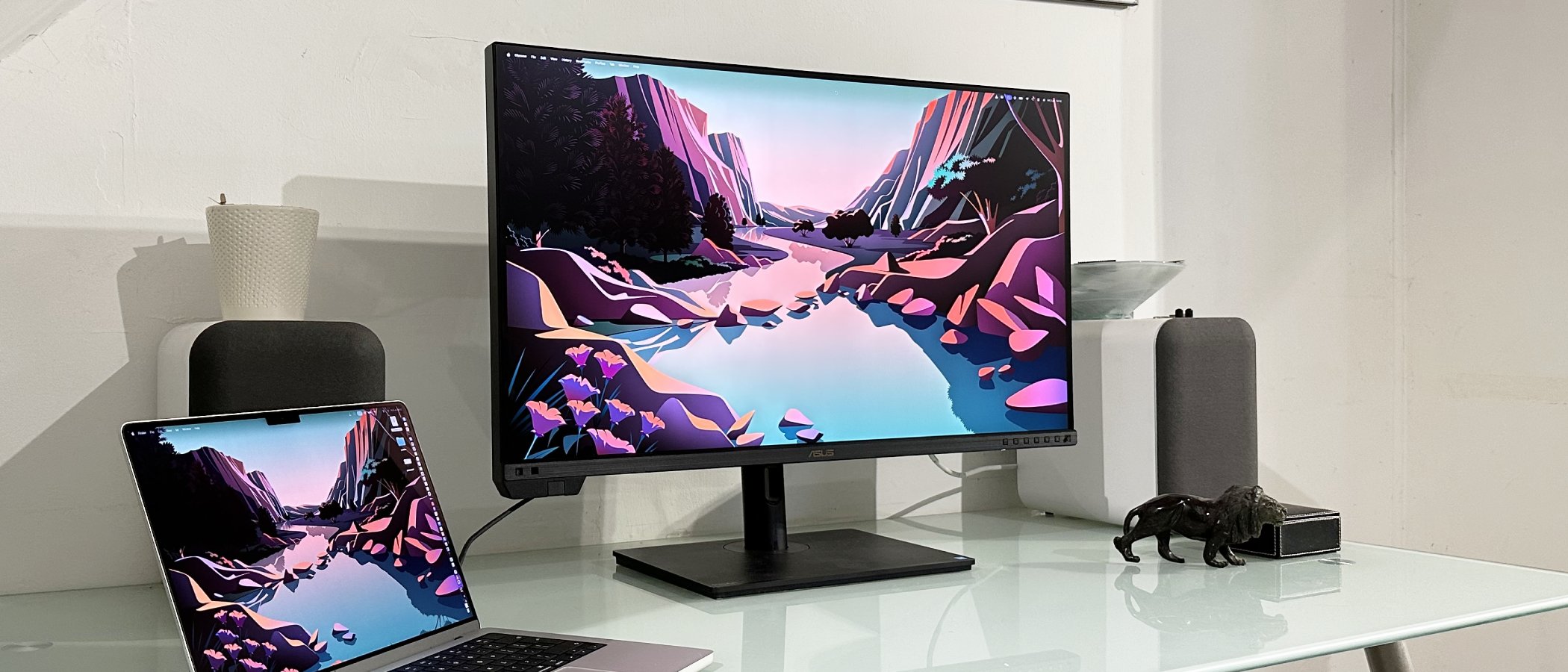 The Asus ProArt PA32KCX 8K monitor on a white desk in a home office during our review process