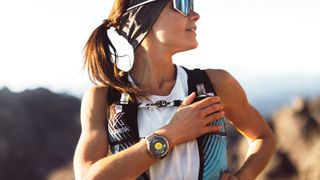 Woman wearing the Polar Grit X2 Pro rugged smartwatch