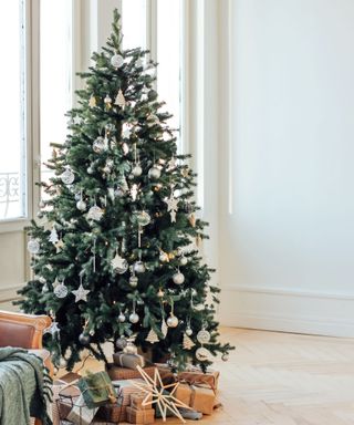 Real Christmas tree with lights and decorations