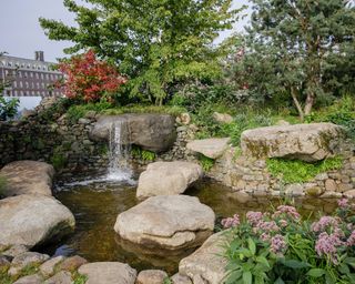 A serene rock pool garden designed by Sarah Eberle for the RHS Chelsea Flower Show 2021