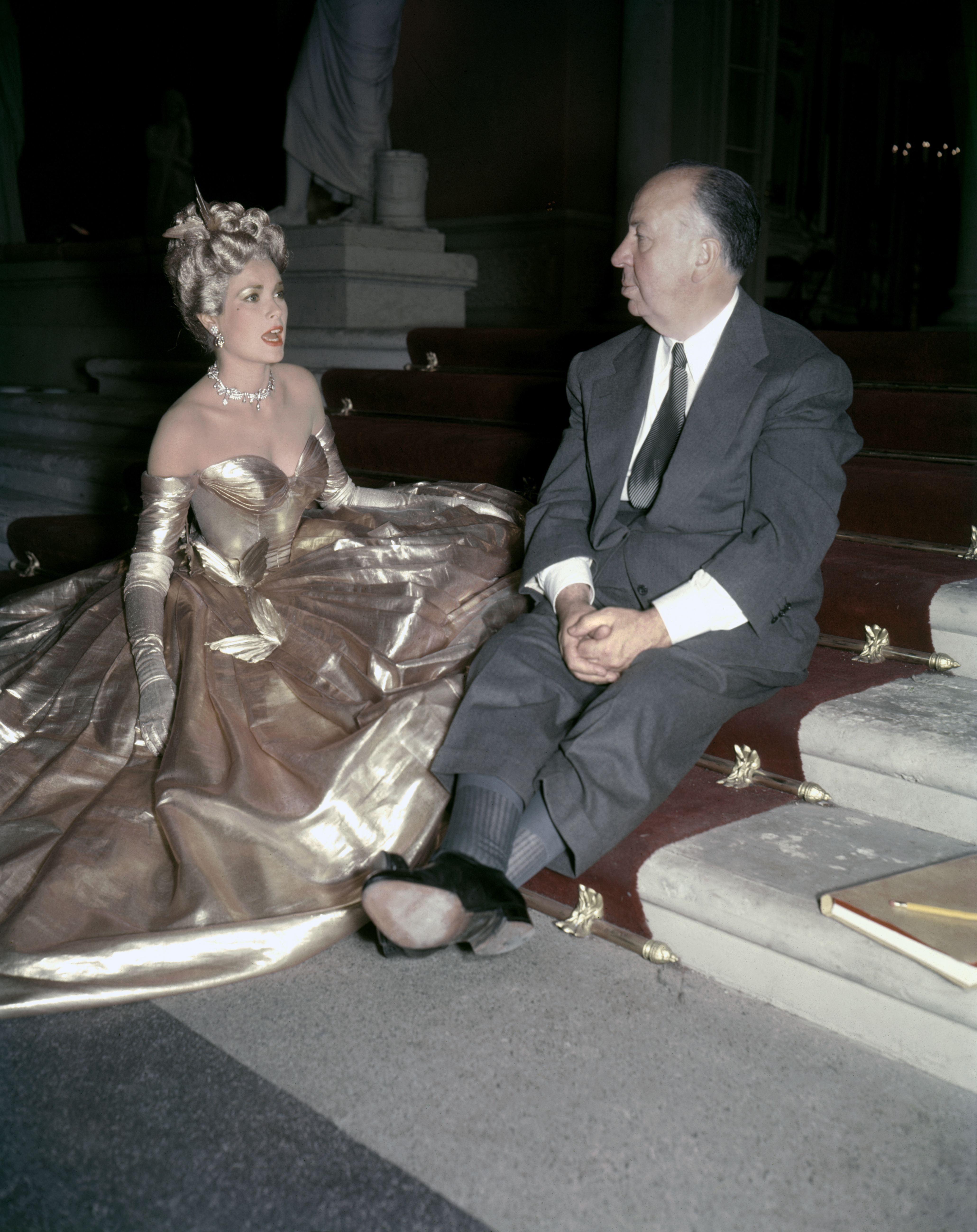 Princess Charlene wears a custom shimmering gold gown from Elie Saab, channeling her late mother-in-law Grace Kelly
