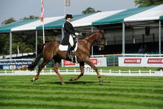 Alex Postolowsky riding Islanmore Ginger during the dressage at The Land Rover Burghley Horse Trials 2013