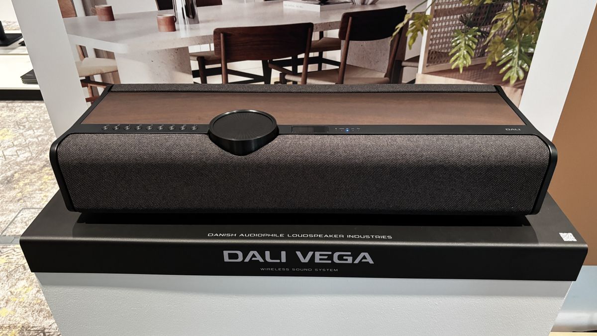 Dali Vega wireless sound system on a plinth in an exhibition space