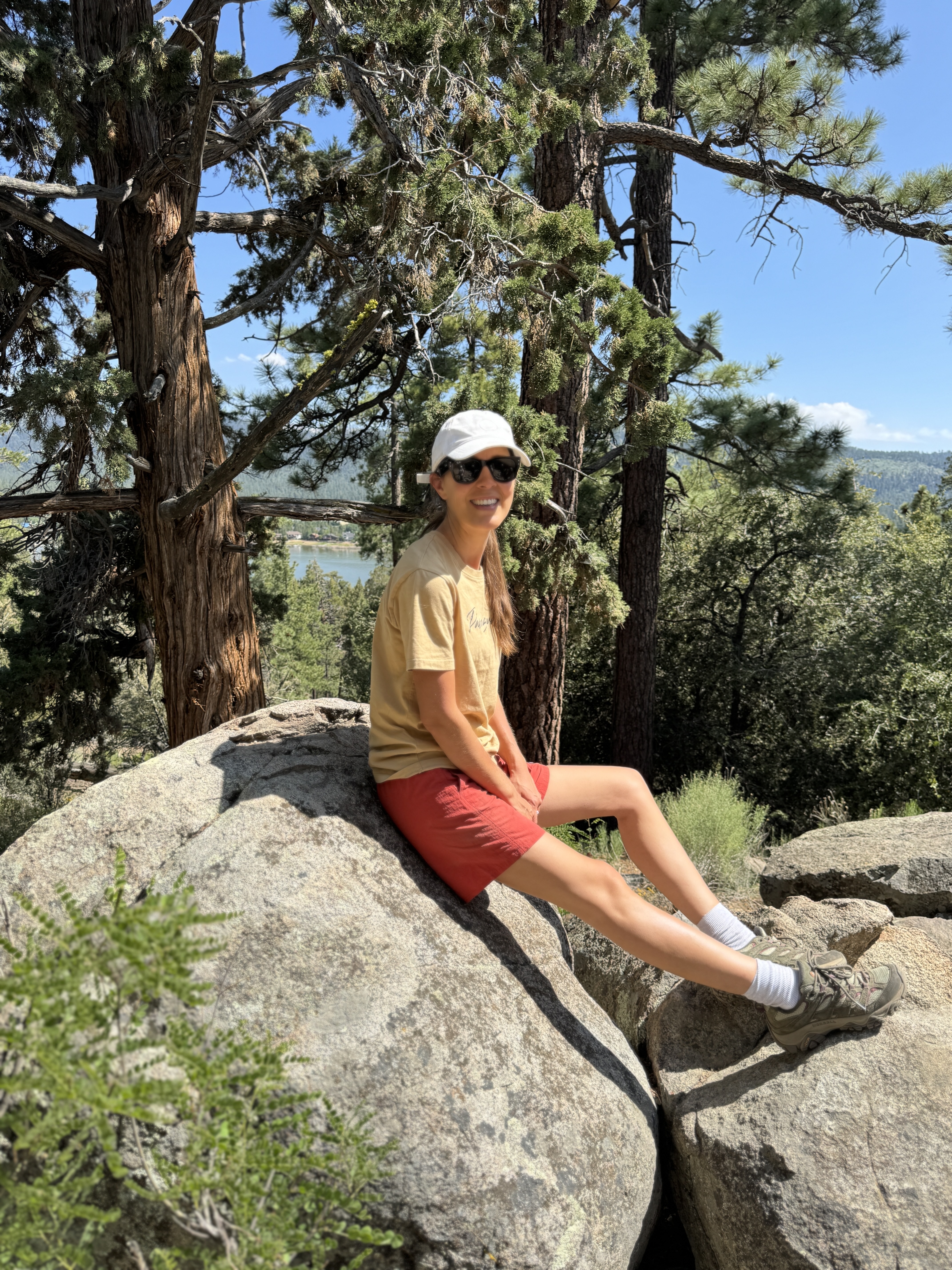 Judith Jones wearing red shorts and a yellow tee.