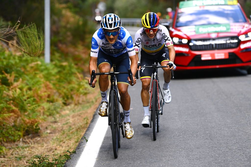NAVACERRADA SPAIN SEPTEMBER 10 LR Richard Carapaz of Ecuador and Team INEOS Grenadiers Polka Dot Mountain Jersey and Sergio Andres Higuita Garcia of Colombia and Team Bora Hansgrohe compete in the breakaway during the 77th Tour of Spain 2022 Stage 20 a 181km stage from Moralzarzal to Puerto de Navacerrada 1851m LaVuelta22 WorldTour on September 10 2022 in Puerto de Navacerrada Spain Photo by Tim de WaeleGetty Images
