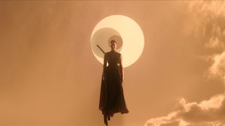 Sophon hovers in the air with 3 suns behind her in Netflix's 3 Body Problem TV series