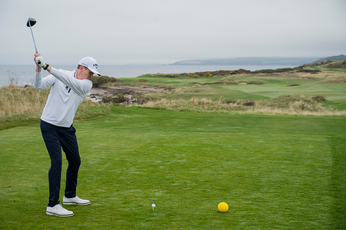 Ben Emerson hitting a driver into a crosswind from the left on the 10th hole at Trump Turnberry