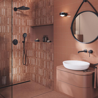 An all brown bathroom with matt black hardware