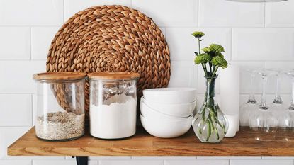 Glass jars with dried food goods inside 