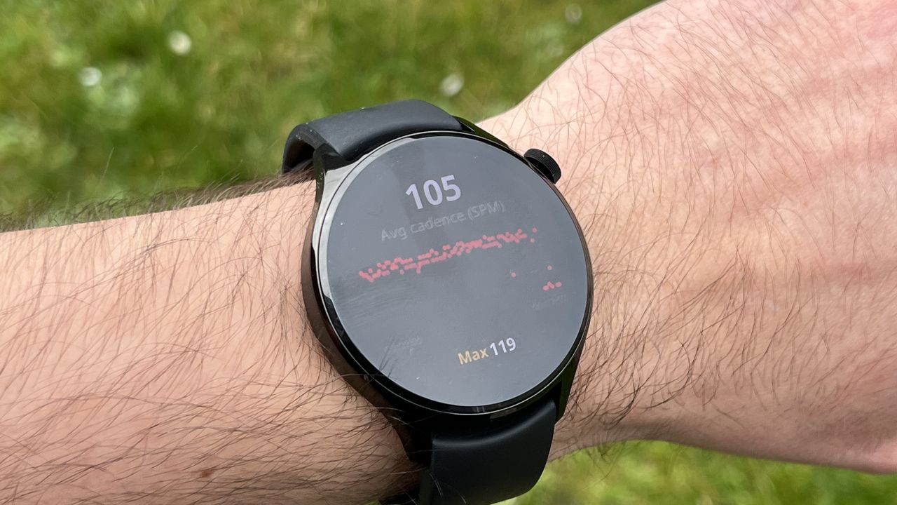 The Xiaomi Watch S1 Pro showing metrics from a workout, against a green background