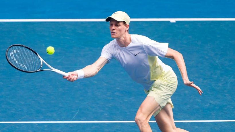  Jannik Sinner of Italy plays a forehand against Holger Rune of Denmark in the Men&#039;s Singles ahead of the Sinner vs de Minaur live stream at the 2025 Australian Open at Melbourne Park