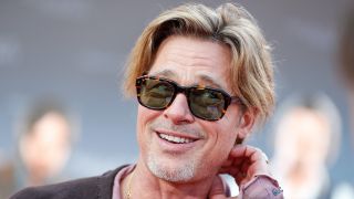 Brad Pitt smiling at the premiere of Bullet Train