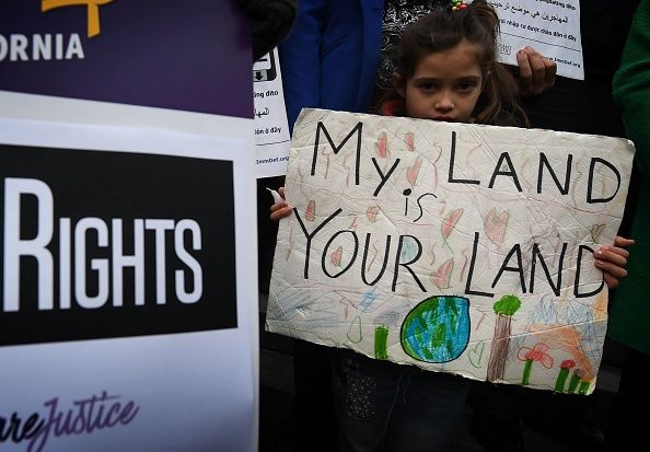 A young protester in favor of sanctuary cities.