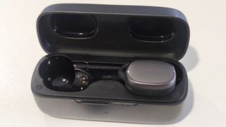 The Earfun Free Pro 3 case with one earbud.