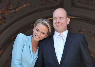 Princess Charlene of Monaco and Prince Albert II of Monaco pose on the balcony after the civil ceremony of the Royal Wedding of Prince Albert II of Monaco to Charlene Wittstock at the Prince's Palace on July 1, 2011 in Monaco.