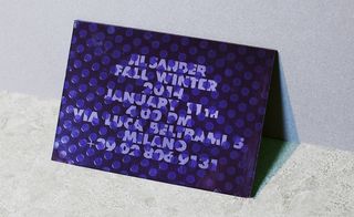 The dark, metallic violet of Jil Sander’s UV-varnished invitation