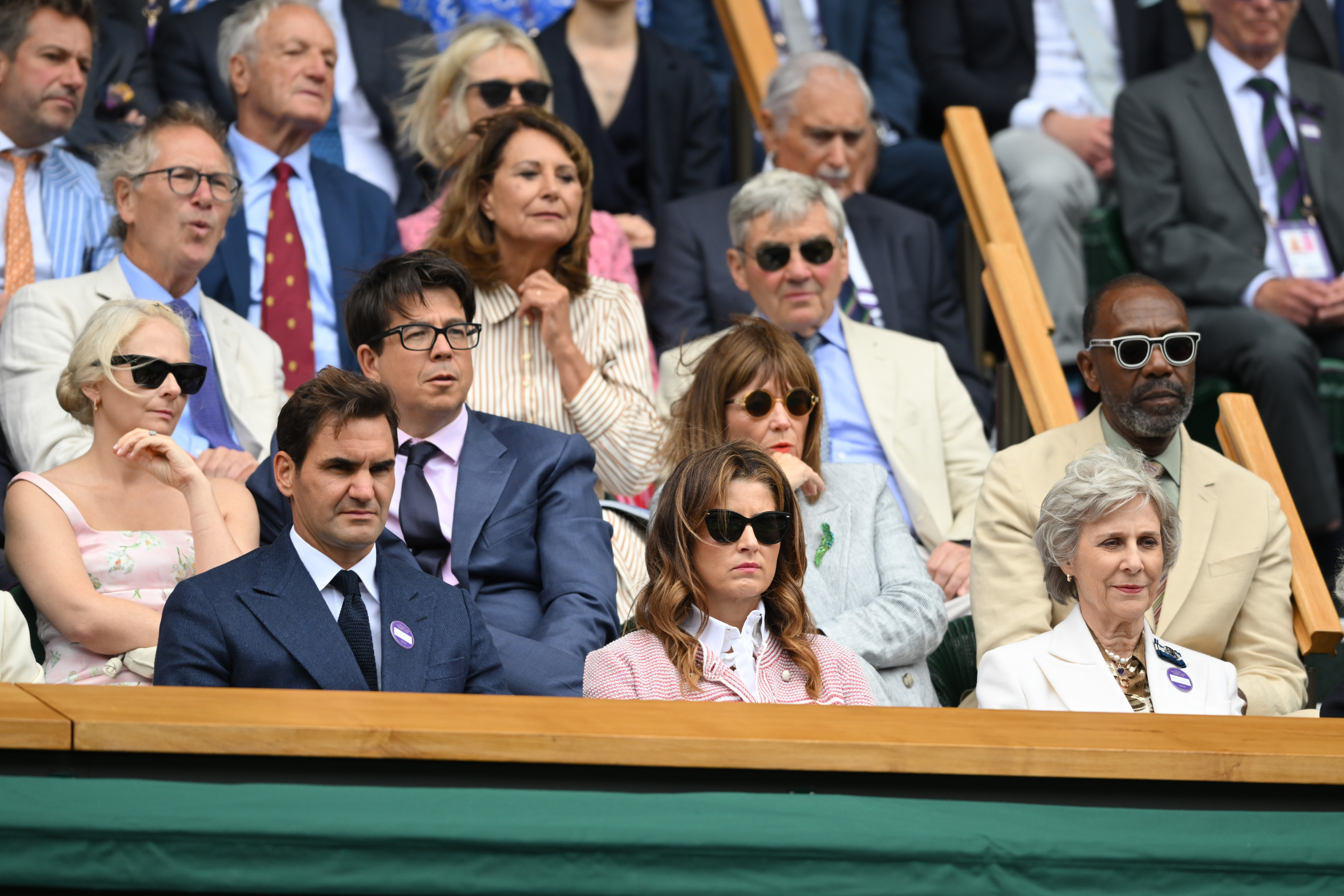 Roger Federer, the Duchess of Gloucester, Carole and Michael Middleton and other guests sitting in the royal box at Wimbledon