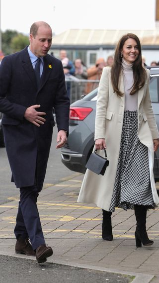 Prince William, Prince of Wales and Catherine, Princess of Wales arrive at Aberavon Leisure & Fitness Centre to hear about how sport and exercise can support mental health and wellbeing during their visit to Wales on February 28, 2023 in Port Talbot, Wales. The Prince and Princess of Wales are visiting communities and mental health initiatives in South Wales ahead of St David's Day, which takes place on March 1.
