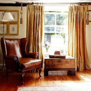 norfolk farmhouse exterior living room with leather chair