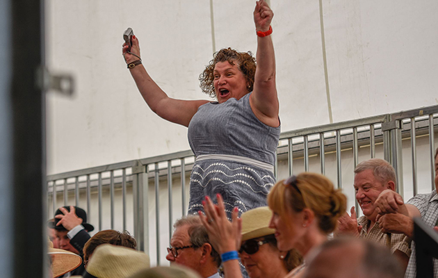 Kerry, one of the Grove and Rufford’s greatest supporters, jumps for joy as Broker 15 is announced as the doghound champion (credit RFM Equine Photos)