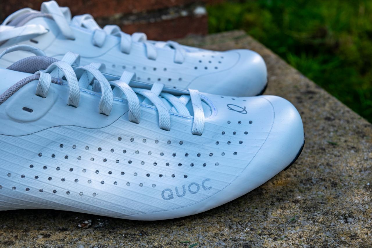 A pair of white Quoc M Pro Lace shoes