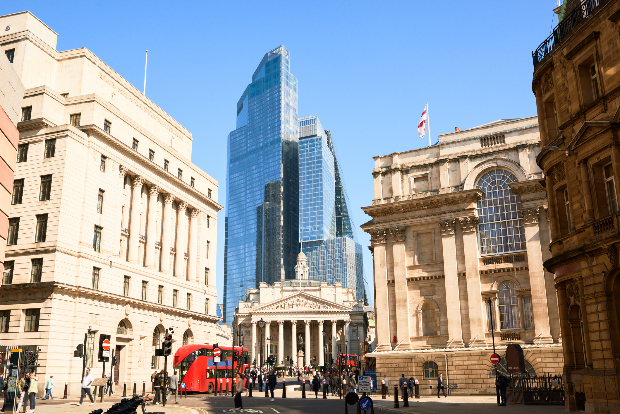 Wide-angle view of the busy financial district around Bank station, London, UK
