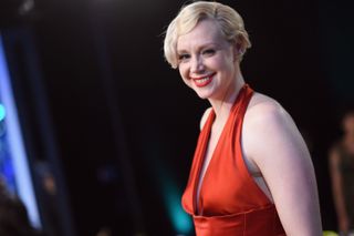 Gwendoline Christie in a red dress. 