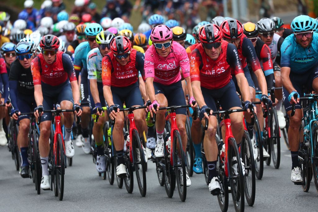 Overall leader INEOS Grenadierss British rider Geraint Thomas C and fellow riders cycle in the pack during the eleventh stage of the Giro dItalia 2023 cycling race 219 km between Camaiore and Tortona on May 17 2023 Photo by Luca Bettini AFP Photo by LUCA BETTINIAFP via Getty Images