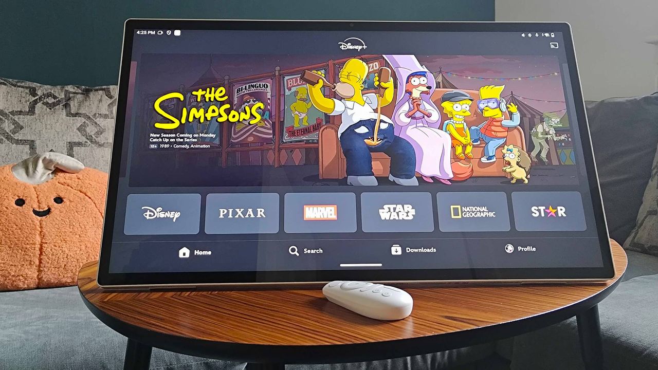 KTC MegPad portable monitor with Disney Plus running on screen and The Simpsons promo banner displayed.