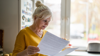 Woman looking at paperwork