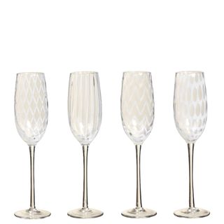 OKA Pulcinella Champagne Glasses against a white background.