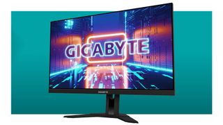 Gigabyte M28U gaming monitor on a blue gradient background