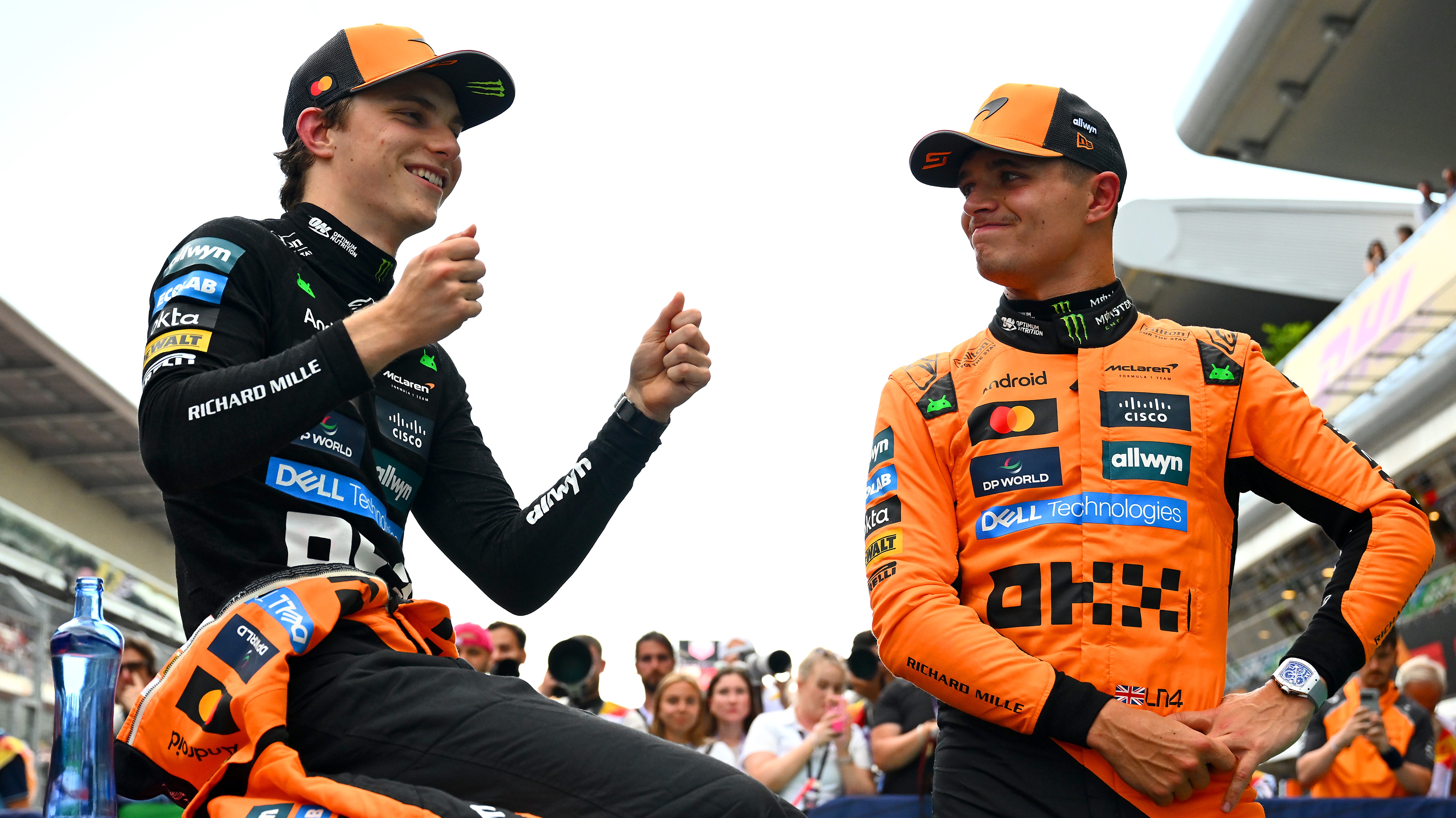 Pole position qualifier Oscar Piastri of Australia and McLaren and Second placed qualifier Lando Norris of Great Britain and McLaren talk in parc ferme during qualifying ahead of the F1 Grand Prix of Spain at Circuit de Barcelona-Catalunya