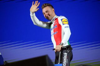 Elia Viviani shows of his special Italian champion's jersey for the Giro