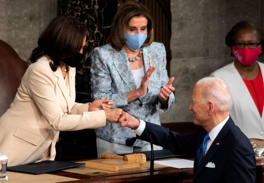 Biden and Vice President Kamala Harris bump fists