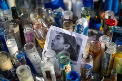 Candles at a memorial for Nipsey Hussle in Los Angeles.
