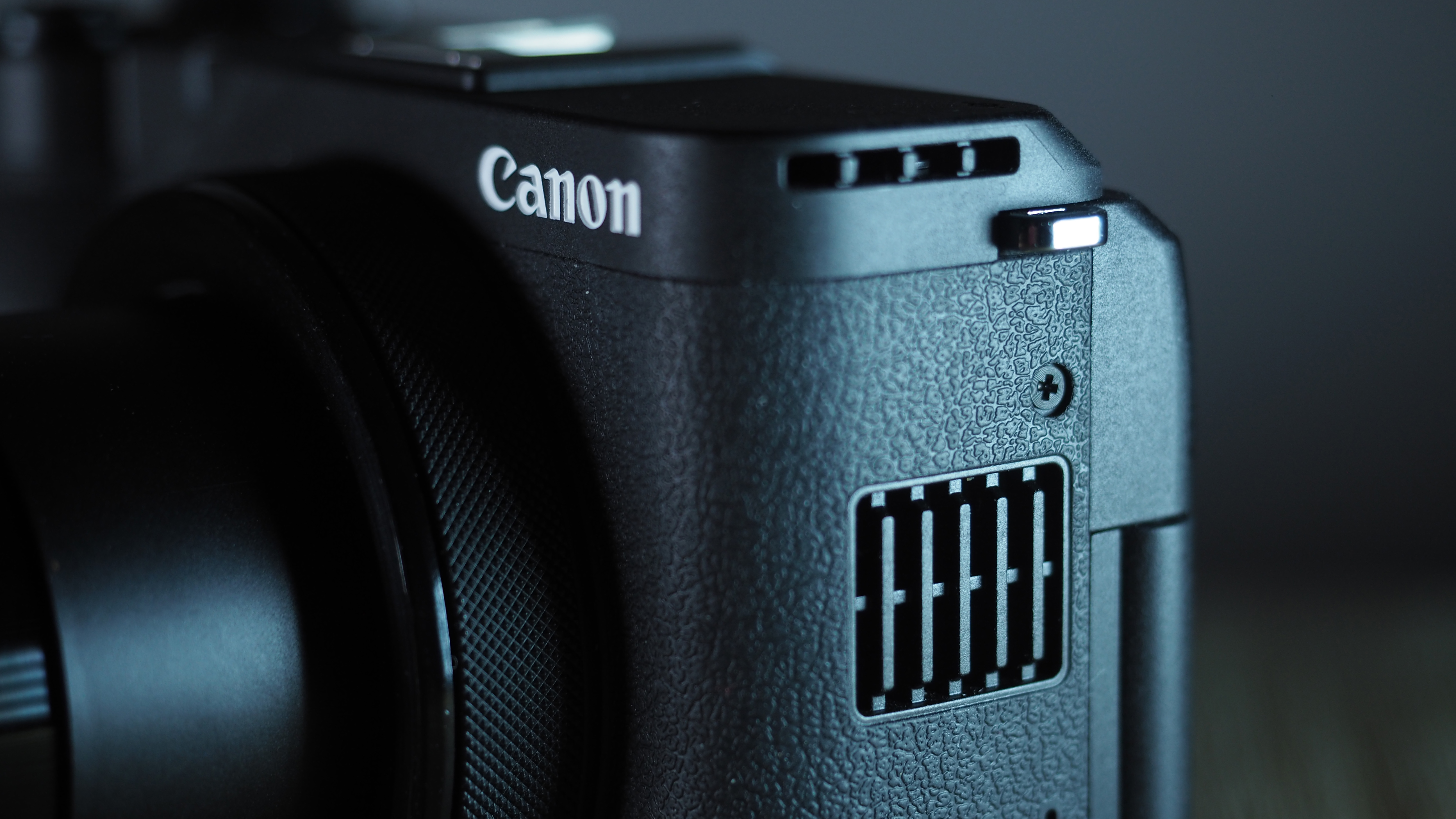 Canon PowerShot V1 on a wooden surface