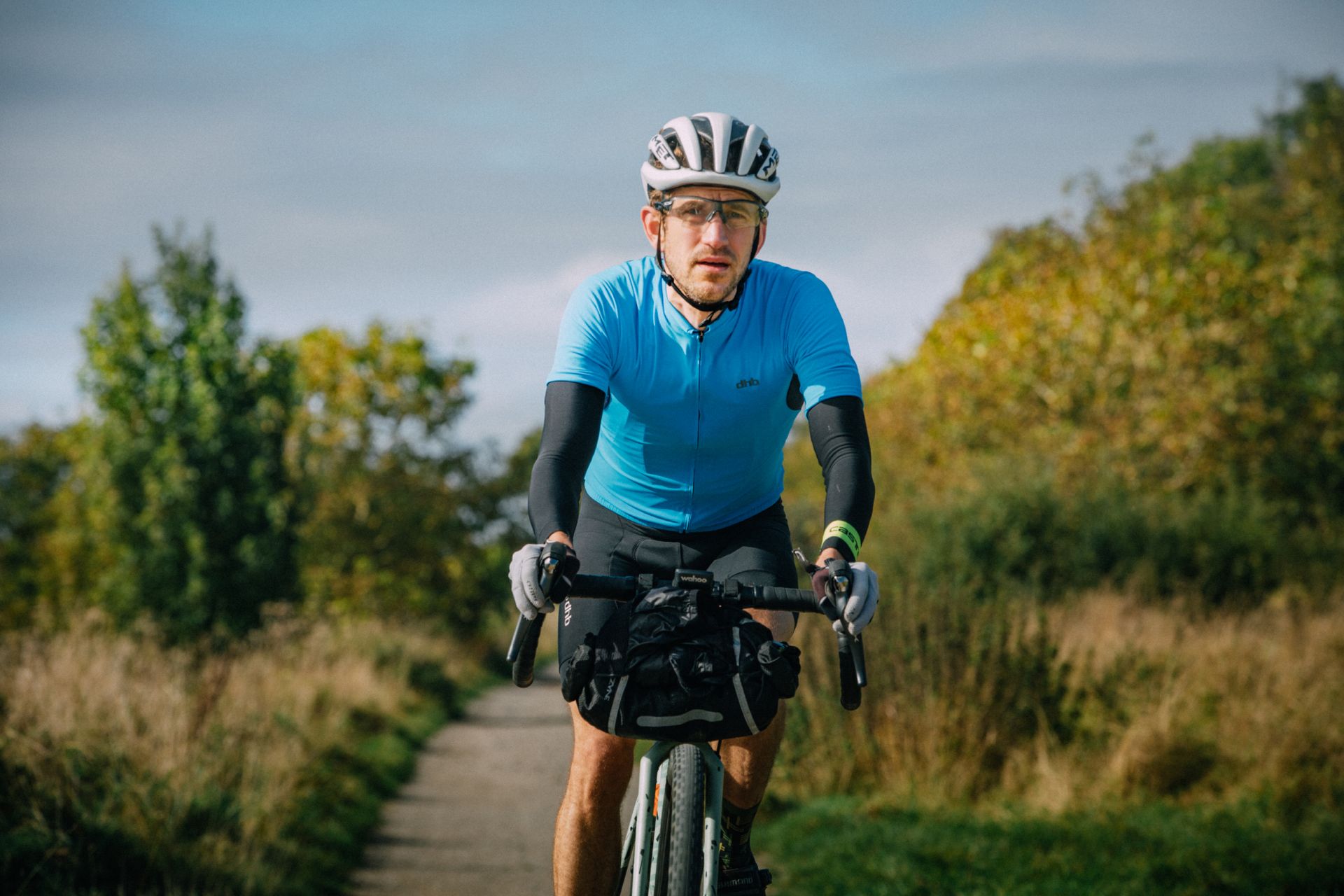 Male cyclist riding a gravel bike on the North Downs Way