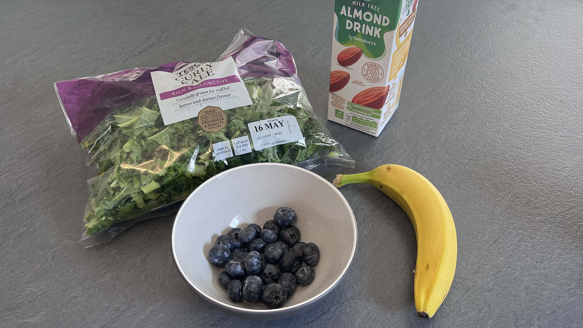 ingredients for banana, kale and blueberry smoothie