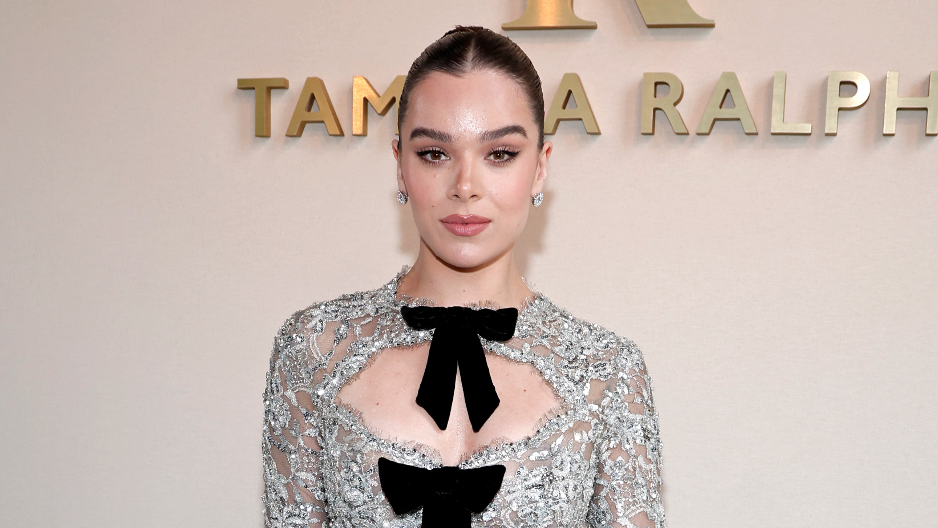 Hailee Steinfeld wore an illusion dress at the Tamara Ralph Couture Week show, the same designer behind her wedding gown