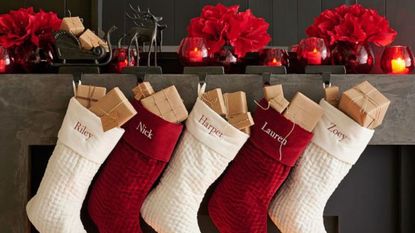 Pottery Barn Holiday Sale - stockings on the mantelpiece.