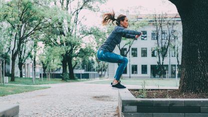 Woman performing a jump squat