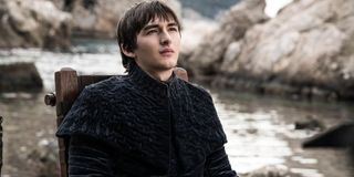 Game of Thrones Bran sitting on the dock, looking up regally